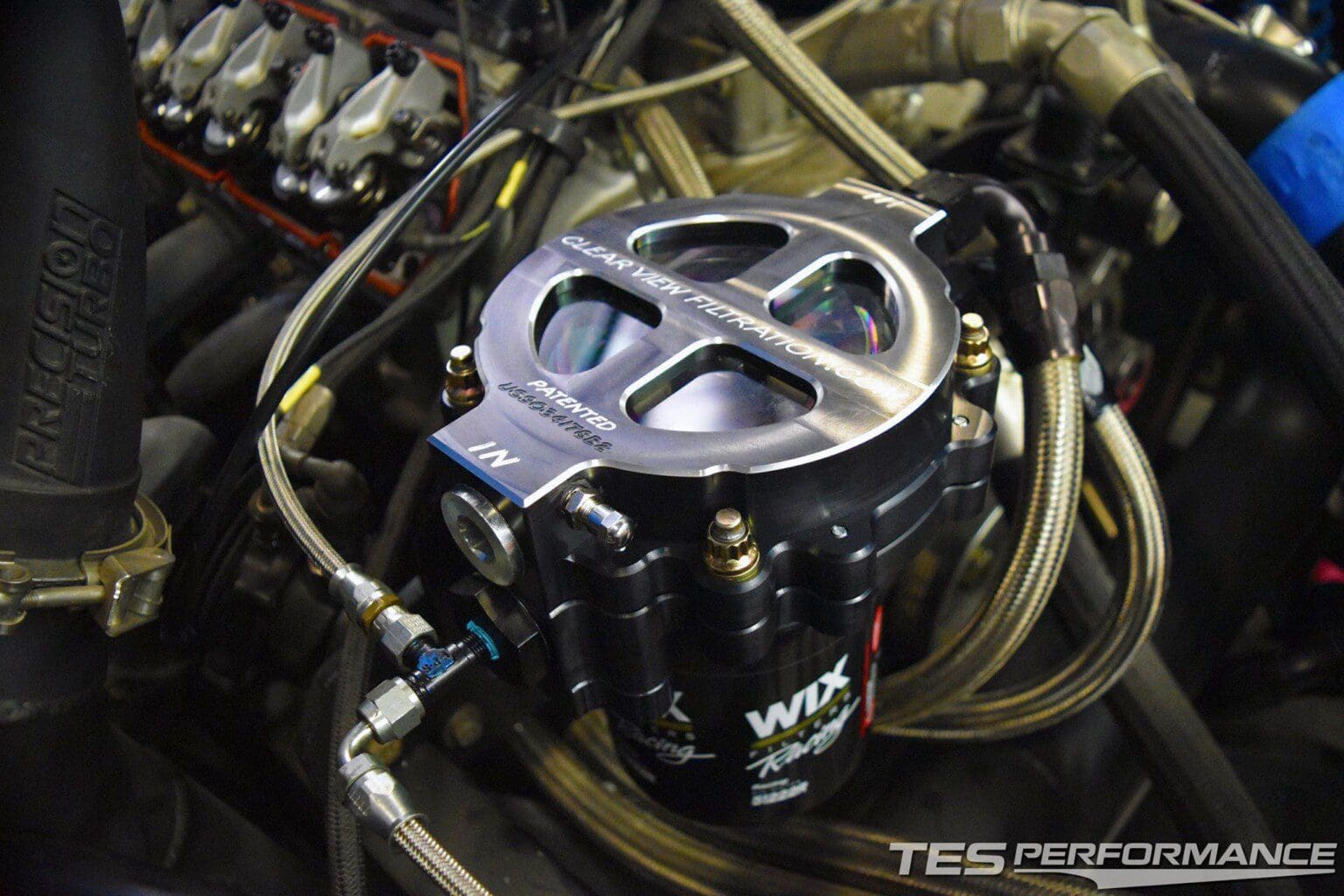 Close-up of a high-performance fuel system component in a car engine.