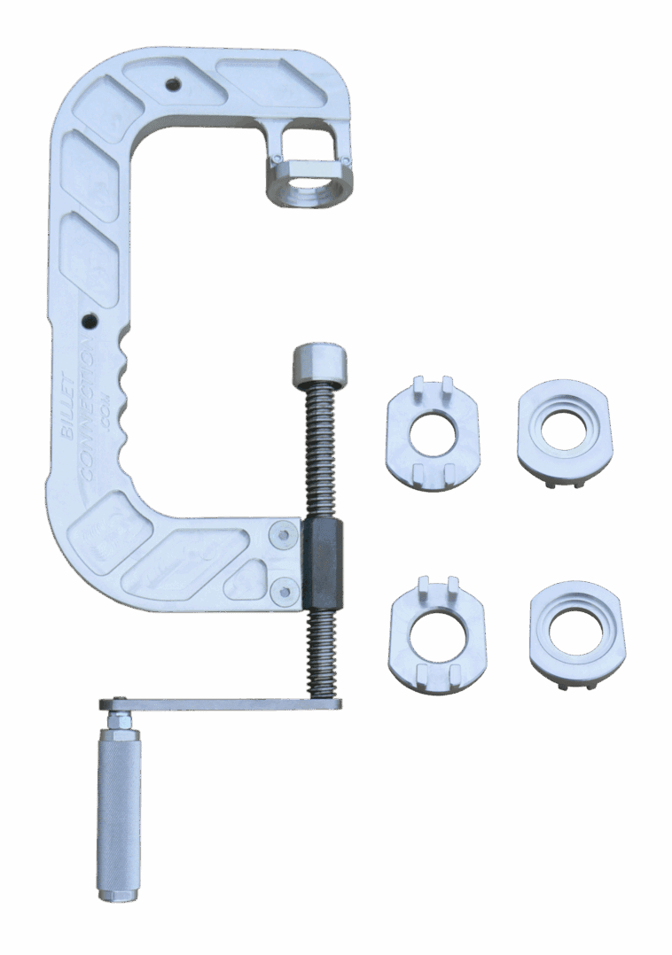 Silver C-clamp with four slotted nuts